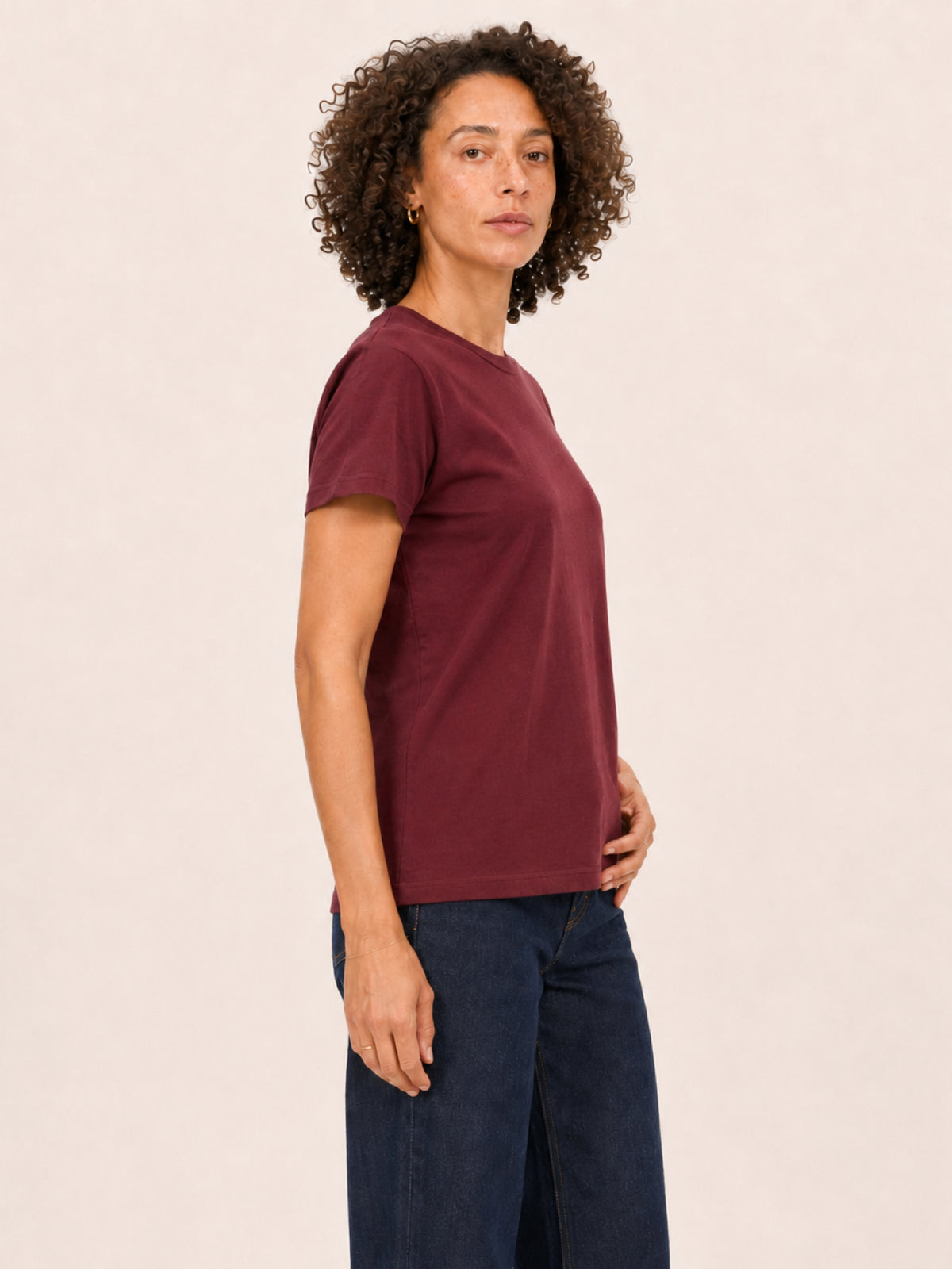 wearing a short-sleeve crew-neck t-shirt